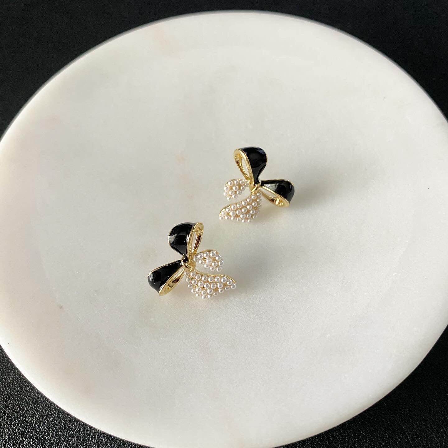 Pearl Tipped Black Enamel Bow Earrings
