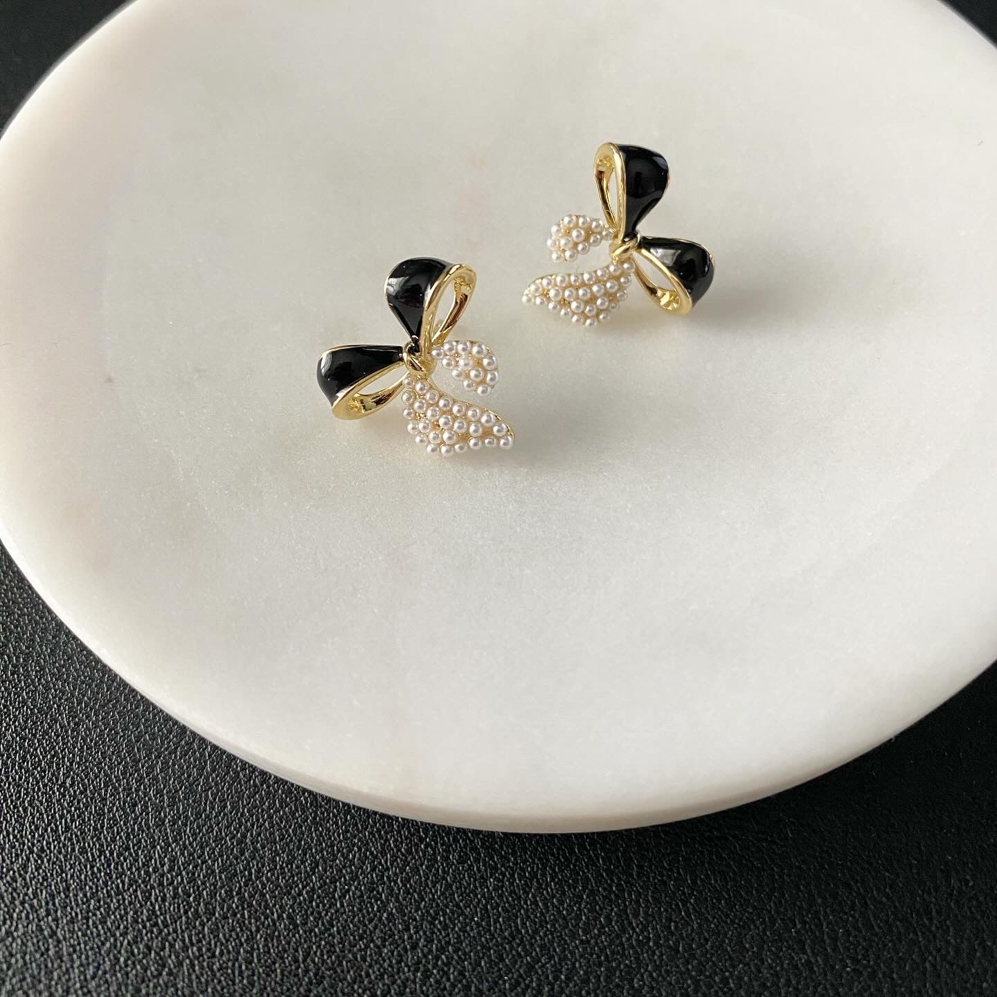Pearl Tipped Black Enamel Bow Earrings