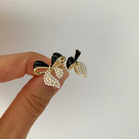 Pearl Tipped Black Enamel Bow Earrings