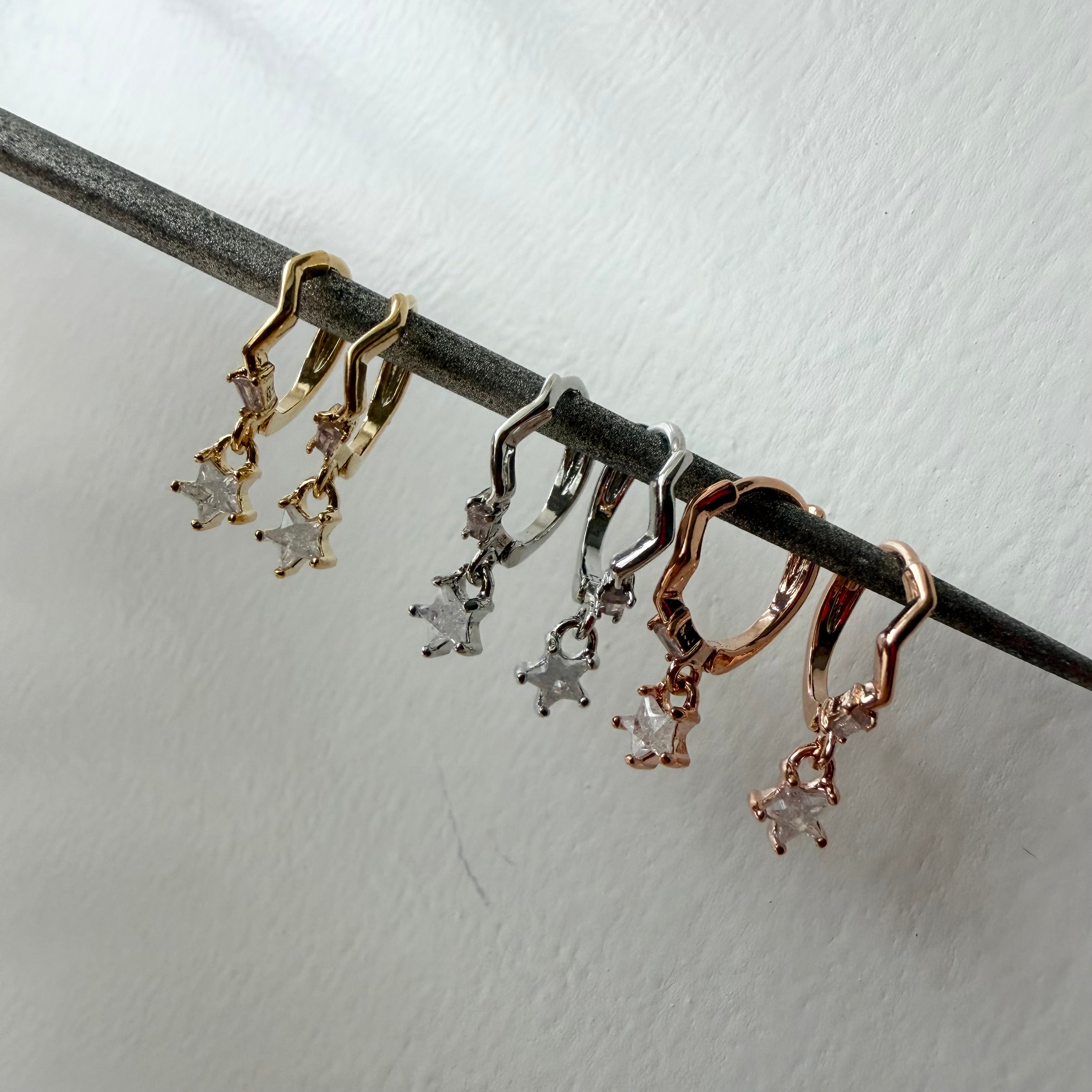 Huggie Hoop Earrings: Zig Zag Star