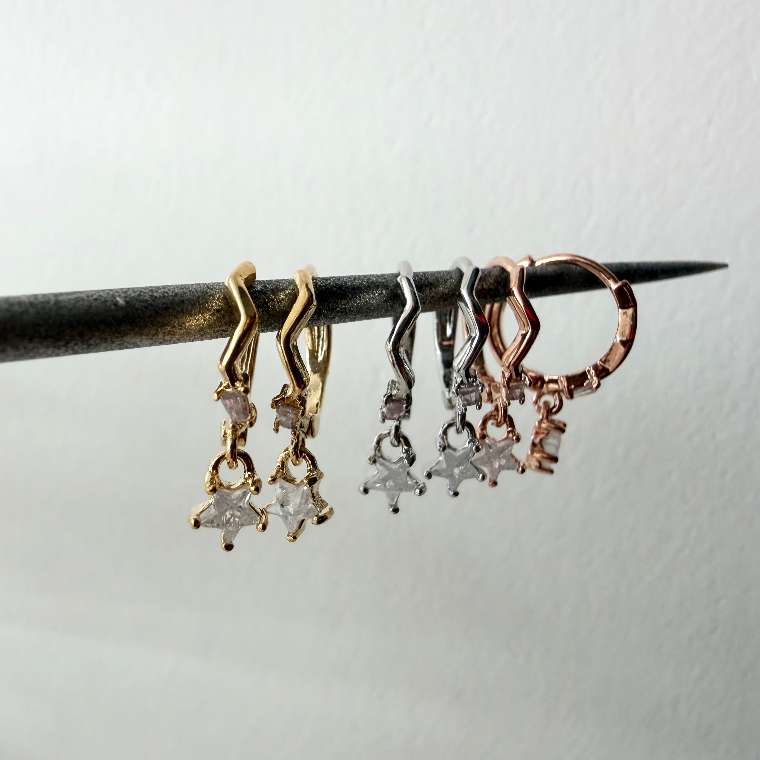 Huggie Hoop Earrings: Zig Zag Star