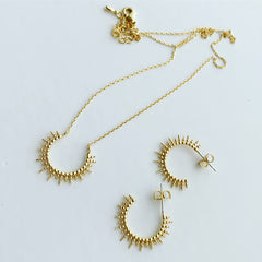 Dotty Sunburst Arc Necklace