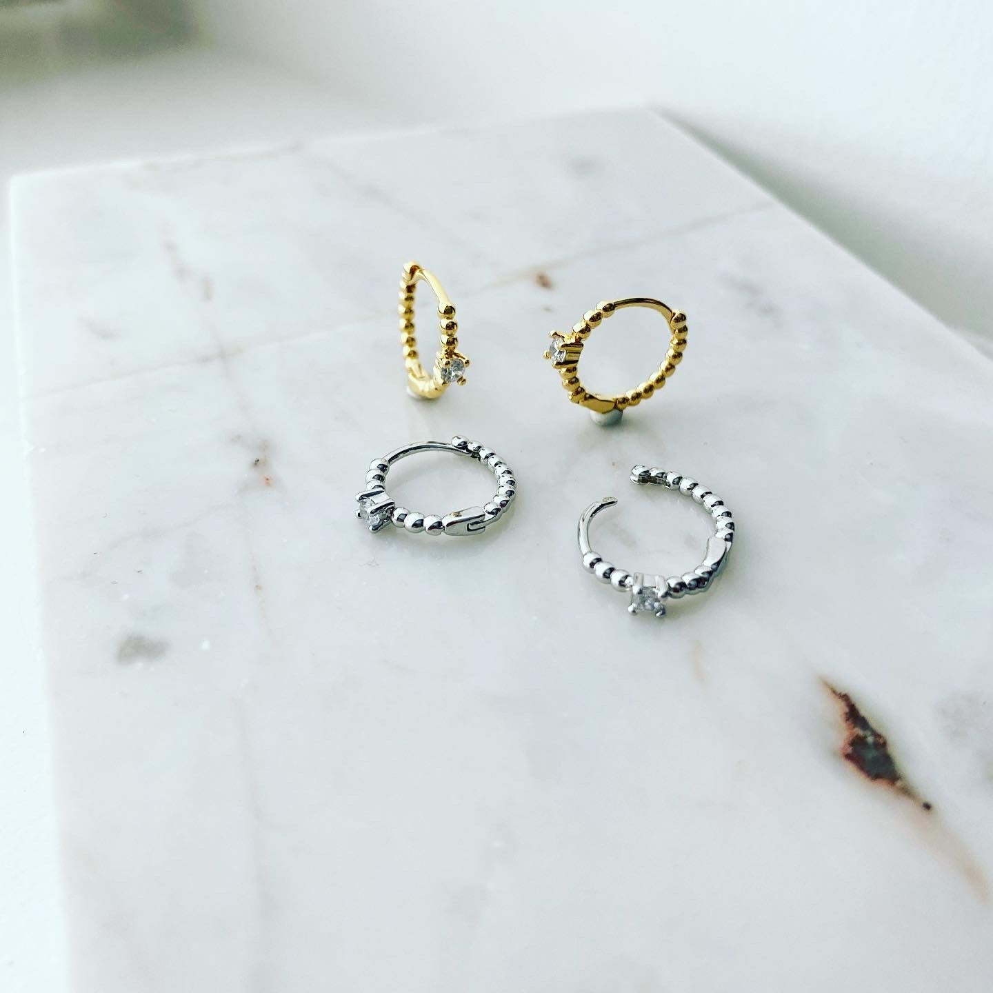 Huggie Hoop Earrings: Dotty Solo CZ