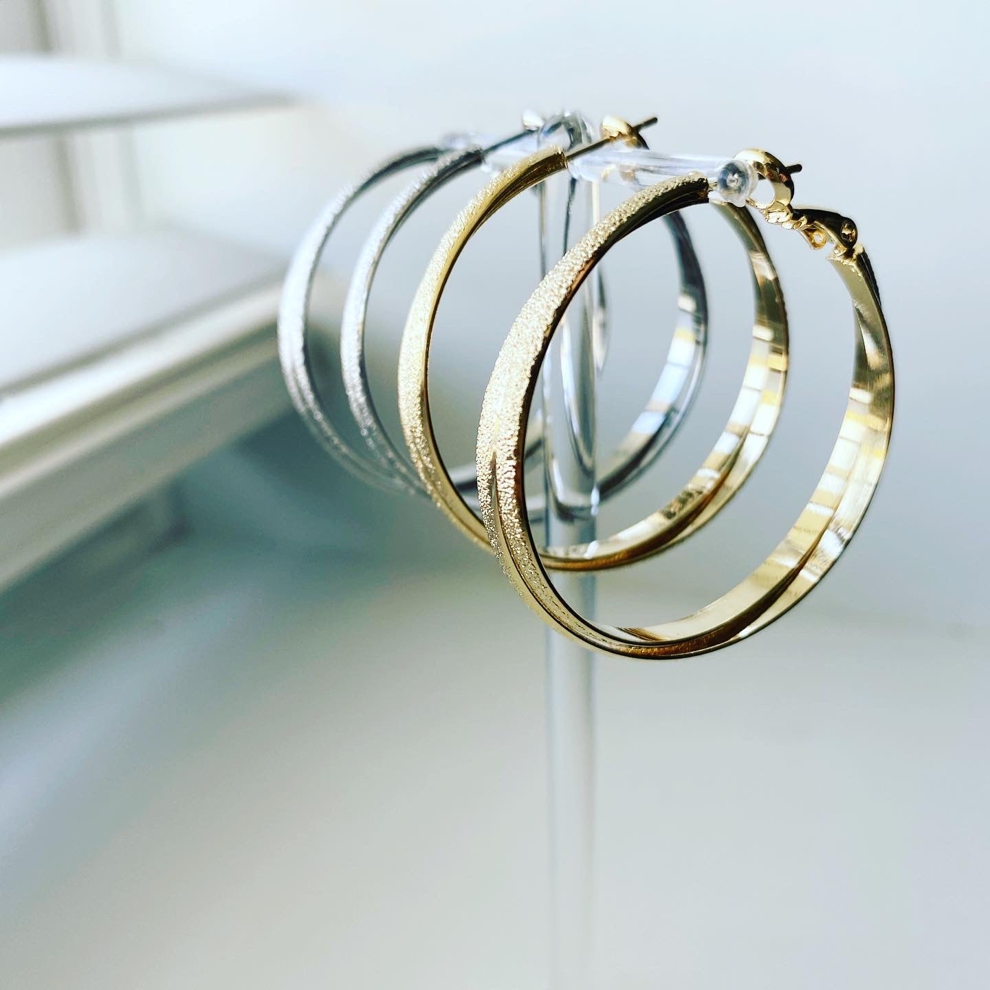 Criss Cross Shimmer Hoop Earrings