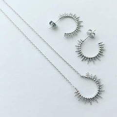 Dotty Sunburst Arc Necklace